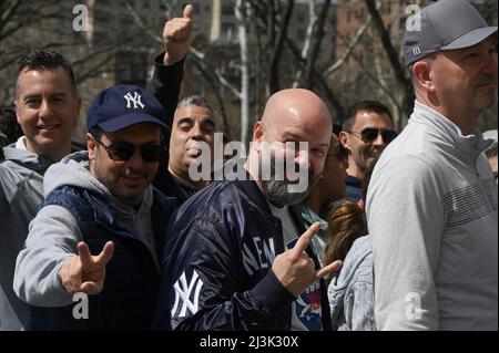 New York, USA. 08th Apr, 2022. Baseball fans express their enthusiasm as they stand in line to enter Yankee Stadium on Yankee opening day 2022, in the Bronx borough of New York City, NY, April 8, 2022. The Yankee's inaugural 2022 game was played against longtime rivals the Boston Red Sox. (Photo by Anthony Behar/Sipa USA) Credit: Sipa USA/Alamy Live News Stock Photo