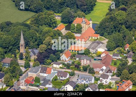 Aerial view, Heeren Castle and Heeren Lutheran Church in the district of Heeren-Werve, Kamen, Ruhr Area, North Rhine-Westphalia, Germany, place of wor Stock Photo