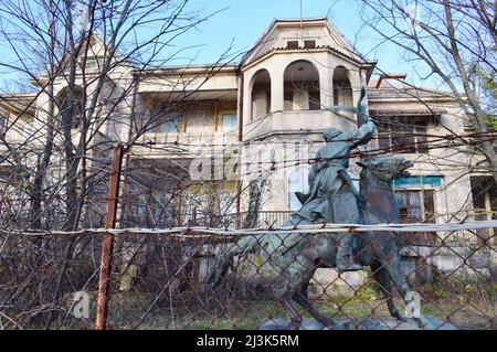 Detail of a sculpture of a hunter riding a horse at the summer Palace of former Royal Greek family at Tatoi, Acharnes, Greece Stock Photo