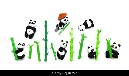 Plasticine pandas and bamboo set. Isolated on white. Clipart, blanks for collage. Stock Photo