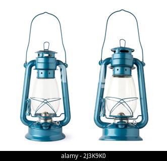 metal hanging hurricane gas lanterns, camping light or interior decoration glass oil lamp, isolated on white background, collection in different angle Stock Photo