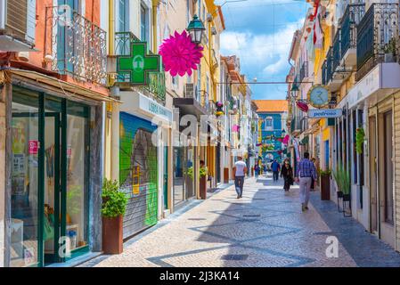 Setubal, Portugal, June 21, 2021: Narrow street of the old town at Portuguese town Setubal. Stock Photo