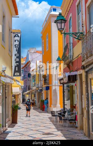 Setubal, Portugal, June 21, 2021: Narrow street of the old town at Portuguese town Setubal. Stock Photo