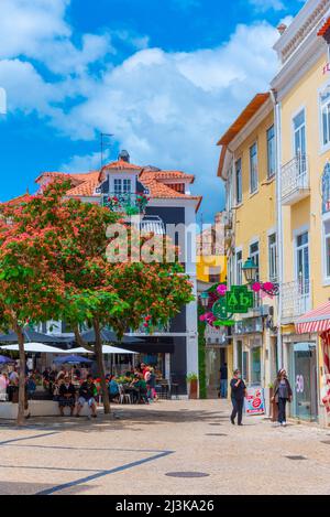 Setubal, Portugal, June 21, 2021: Narrow street of the old town at Portuguese town Setubal. Stock Photo