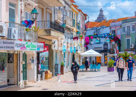 Setubal, Portugal, June 21, 2021: Narrow street of the old town at Portuguese town Setubal. Stock Photo