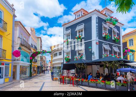 Setubal, Portugal, June 21, 2021: Narrow street of the old town at Portuguese town Setubal. Stock Photo