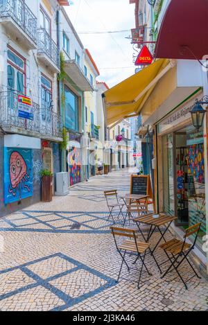 Setubal, Portugal, June 21, 2021: Narrow street of the old town at Portuguese town Setubal. Stock Photo