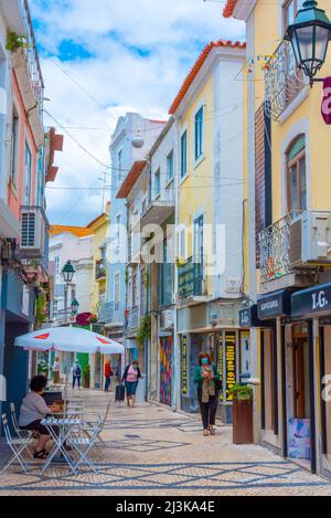 Setubal, Portugal, June 21, 2021: Narrow street of the old town at Portuguese town Setubal. Stock Photo