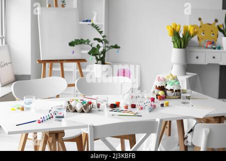 Interior of room prepared for master-class in art on Easter eve Stock Photo