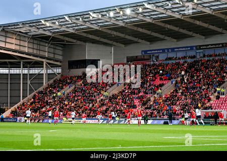 Llanelli, Wales. 8 April 2022. The Welsh football fans during the FIFA Women's World Cup Qualifier Group I match between Wales Women and France Women at Parc y Scarlets in Llanelli, Wales, UK on 8 April 2022. Credit: Duncan Thomas/Majestic Media. Stock Photo