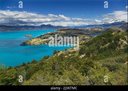 View across Lago General Carrera to mountains and glaciers of the Campo de Hielo Norte, near Puerto Rio Tranquilo along Carretera Austral in Chile Stock Photo