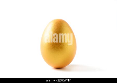 golden a easter egg isolated on white background. Stock Photo
