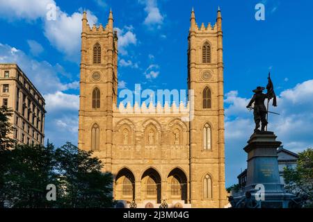 Notre-Dame Basilica and Maisonneuve Monument in Montreal; Montreal, Quebec, Canada Stock Photo