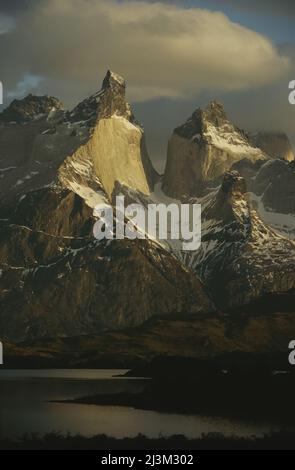 Granite mountain walls at dawn.; TORRES DEL PAINE NATIONAL PARK, CHILE. Stock Photo