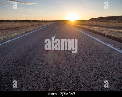 Sunrise on the Great Northern Highway near the Ngumpan Cliffs, KImberley Stock Photo