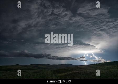 Lightning strikes from a passing supercell thunderstorm in Saskatchewan; Val Marie, Saskatchewan, Canada Stock Photo