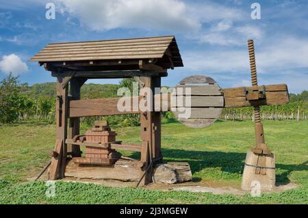 historic wooden wine press in vineyard of Prellenkirchen,Burgenland,Austria Stock Photo