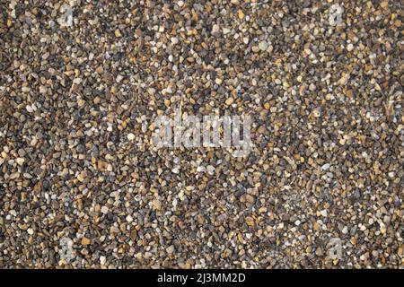 Small pebbles, stones close-up. Wallpaper, space for text Stock Photo