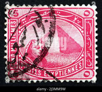Egyptian pyramids on vintage postage stamp Stock Photo - Alamy