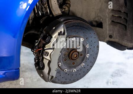 Automobile brake disc without wheels, car service concept Stock Photo