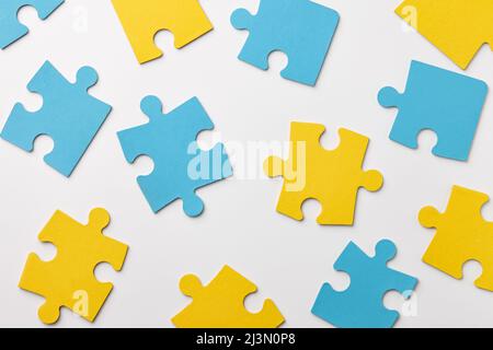 Ukrainian colors puzzle pieces on white background Stock Photo