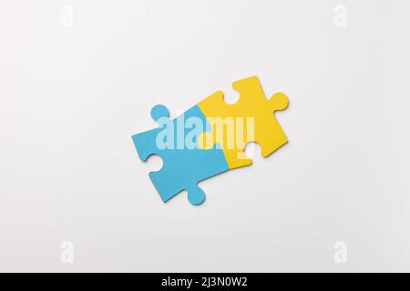 Ukrainian colors puzzle pieces on white background Stock Photo