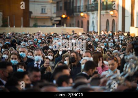 Malaga, Spain. 09th Apr, 2022. Faithful are seen gathered while looking at the statue of Christ and the Virgin Mary of the 'Cautivo' brotherhood during a transfer through the streets toward the brotherhood, ahead of to start of the Spanish Holy Week. After two years without Holy Week due to the coronavirus pandemic, thousands of faithful wait to see the processions bearing the statues of Christ and the Virgin Mary on the streets as part of traditional Holy Week. In Andalusia, the Holy Week celebration congregates thousands of people from all countries, and it's considered one of the most impor Stock Photo