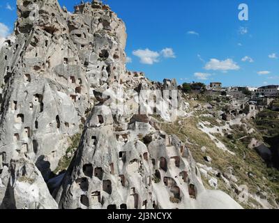 Cappadocia ancient cave dwellings. Landscape, areal view of unique rock formations and caves in Cappadocia, Turkey Stock Photo