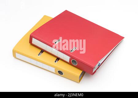 Yellow, red and gray office folder on white background. Stock Photo