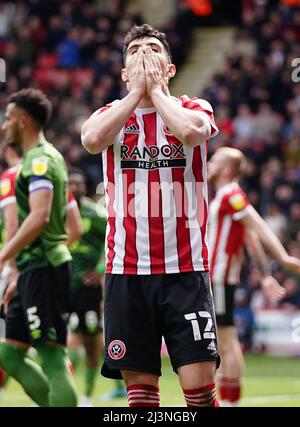 Sheffield United's John Egan stands dejected after a shot goes over the bar during the Sky Bet Championship match at Bramall Lane, Sheffield. Picture date: Saturday April 9, 2022.