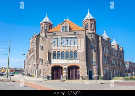 Beautiful castle building called 'Kasteel Duinweg'. Former police station and fire station in the fishing village of Scheveningen, Holland. Stock Photo
