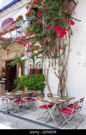 Beautiful old center of Marbella city in a sunny day of December. Restaurants, shops. Touristic destination Stock Photo