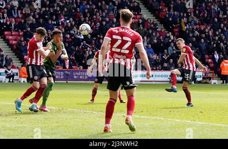 Sheffield, UK. 9th April 2022.  Filip Uremovic of Sheffield Utd (R) shoots over during the Sky Bet Championship match at Bramall Lane, Sheffield. Picture credit should read: Andrew Yates / Sportimage Credit: Sportimage/Alamy Live News Stock Photo