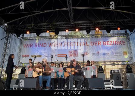 Vienna, Austria. May 30, 2010 Festival of Districts at Karlsplatz in Vienna. Picture shows Ulli Bäer, Austrian pop singer and guitarist (front L) Stock Photo