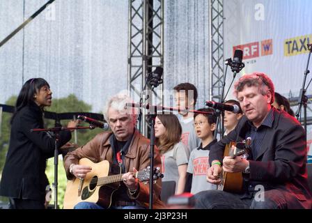 Vienna, Austria. May 30, 2010 Festival of Districts at Karlsplatz in Vienna. Picture shows Ulli Bäer, Austrian pop singer and guitarist (front L) Stock Photo