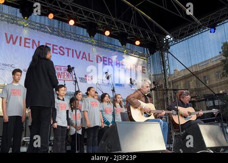 Vienna, Austria. May 30, 2010 Festival of Districts at Karlsplatz in Vienna. Picture shows Ulli Bäer, Austrian pop singer and guitarist (front L) Stock Photo