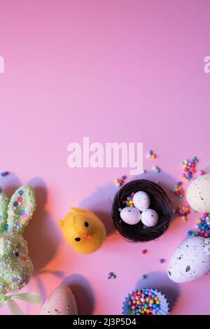 background easter colorful violet with eggs,chick and rabbit Stock Photo