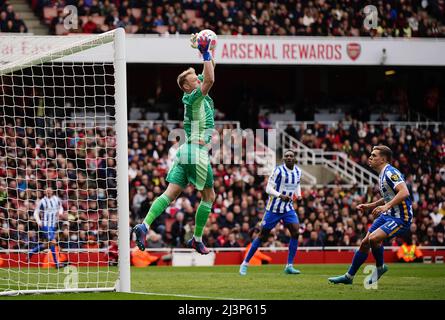 Arsenal goalkeeper Aaron Ramsdale makes a save during the Premier League match at the Emirates Stadium, London. Picture date: Saturday April 9, 2022. Stock Photo