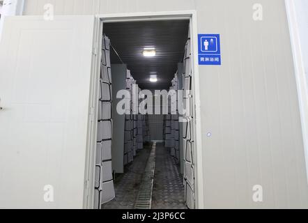 Shanghai. 9th Apr, 2022. Photo taken on April 9, 2022 shows the interior view of a makeshift hospital converted from the National Exhibition and Convention Center (Shanghai) in east China's Shanghai. Credit: Li He/Xinhua/Alamy Live News Stock Photo