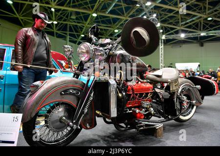 Moscow, Russia. 9th Apr, 2022. A visitor views a motorcycle during the Motospring exhibition in Moscow, Russia, April 9, 2022. Credit: Alexander Zemlianichenko Jr/Xinhua/Alamy Live News Stock Photo