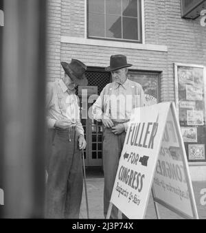 Fayetteville, Arkansas. On the town square. [Sign: 'Fuller for Congress - Headquarters Up-Stairs']. Stock Photo