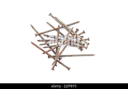 Pile of old rusty nails isolated on white background Stock Photo