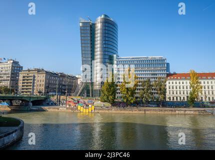 UNIQA Tower at Donaukanal (Danube Canal) - Vienna, Austria Stock Photo