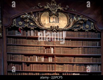 Bookshelf and old books in the State Hall of Austrian National Library - Vienna, Austria Stock Photo