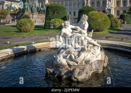 Triton and Naiad fountain at Maria Theresa Square (Maria Theresien Platz) by Hugo Haerdtl, 1894- Vienna, Austria Stock Photo