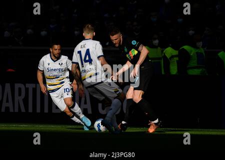 Milano, Italy. 09th Apr, 2022. Gianluca Caprari and Ivan Ilic of Hellas Verona, Milan Skriniar of FC Internazionale during the Serie A football match between FC Internazionale and Hellas Verona at San Siro stadium in Milano (Italy), April 9th, 2021. Photo Andrea Staccioli/Insidefoto Credit: insidefoto srl/Alamy Live News Stock Photo