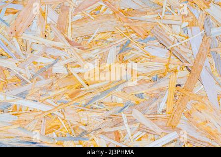 Compressed light brown wooden texture used for constructions. Hight quality photo Stock Photo