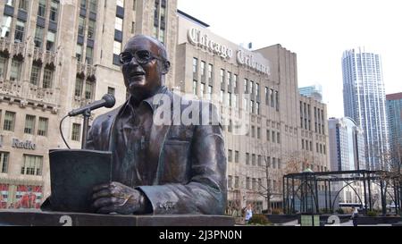 CHICAGO, ILLINOIS, UNITED STATES - DEC 11, 2015: Outdoor sculpture of Jack Brickhouse is seen along Michigan Avenue near the Chicago River Bridge. The Stock Photo