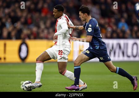 AMSTERDAM - (lr) Sebastien Haller of Ajax, Jeremy van Mullem of Sparta Rotterdam during the Dutch Eredivisie match between Ajax and Sparta Rotterdam at the Johan Cruijff ArenA on April 9, 2022 in Amsterdam, Netherlands. ANP MAURICE VAN STEEN Stock Photo