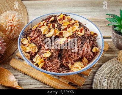 Chocolate Black Forest cake in a dish side view on wooden table taiwan food Stock Photo